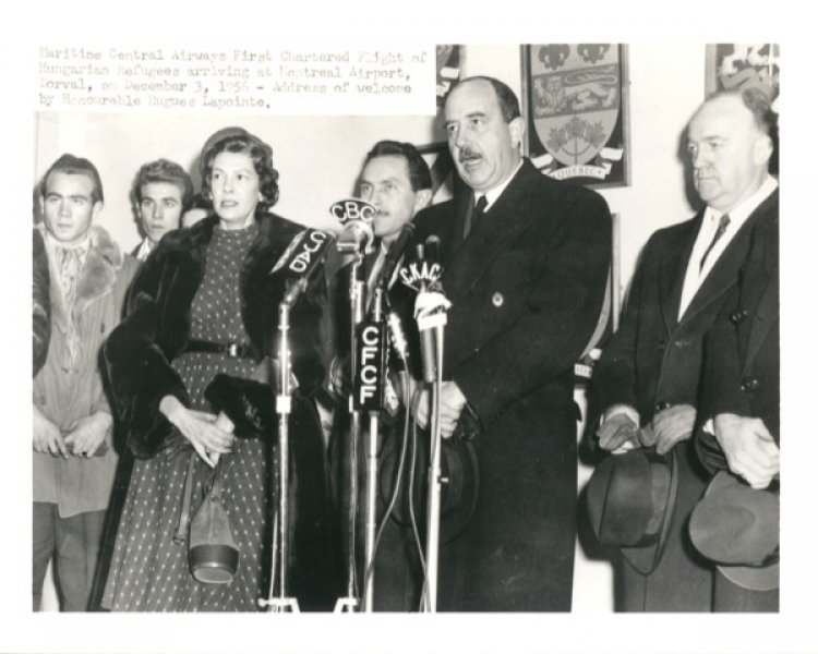 Hungarian refugees arriving at Montreal airport, Dorval, Quebec, December 3, 1956. Canadian Museum of Immigration at Pier 21 (D2014.10.4).