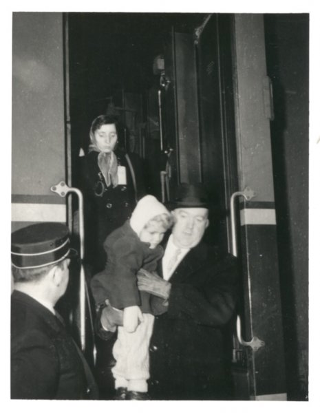 First Hungarian refugees with Immigration officer William A. McFaul at Rouyn-Noranda, Quebec, 1956. Canadian Museum of Immigration at Pier 21 (D2014.10.8).