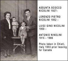 Man and woman with small child and baby between them.