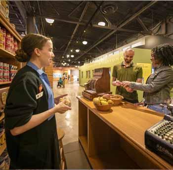 An interpreter shares the story of the historic Pier 21 to visitors.