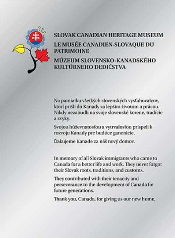 Shiny silver plaque with colourful flowers.