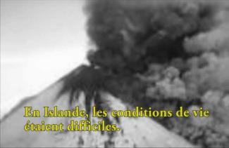 Black smoke billows out from a volcano.