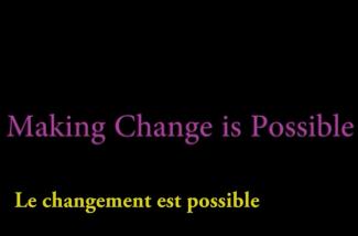 Bright purple letters on a black background.