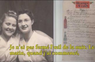 Two young female friends are hugging each other and smiling.