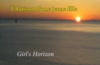 The sun sinks below the horizon on a beach.