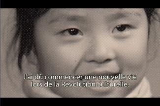 A young girl's smiling face.