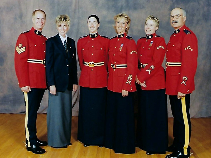Group of young people standing for a photo.