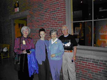Anne and Catherine as older women, visiting Pier 21 as part of a reunion.