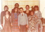 Coloured family photo showing nine family members.