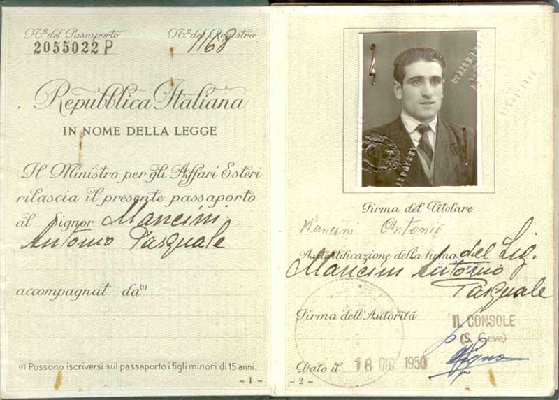 Faded Italian passport, opened to photo page.