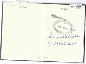 Passport page with writing and stamps.