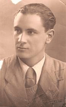 Sepia-toned portrait of a young man in suit and tie.