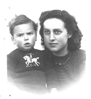 Family portrait of young woman with baby boy in her arms.