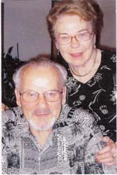 Recent coloured photo of Ursula and Manfred, both wearing glasses.