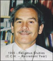 Bruno as an older man standing in front of book shelf.