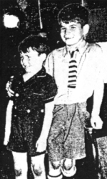 Colin and Hugh as very young boys, dressed in short suits.