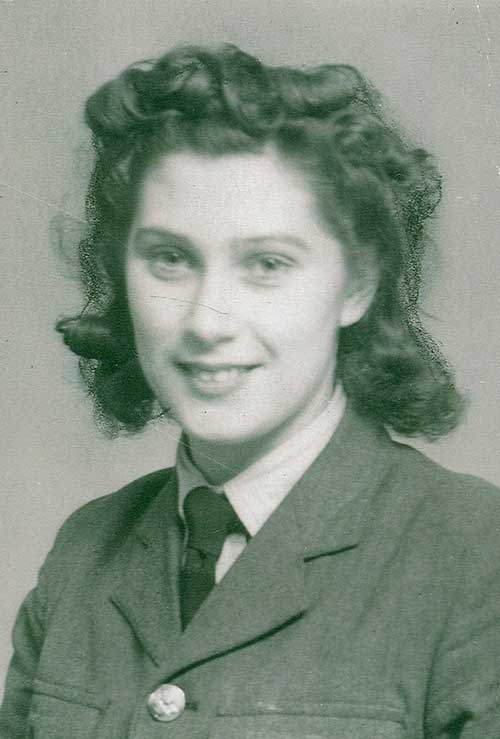 A young woman in military uniform.