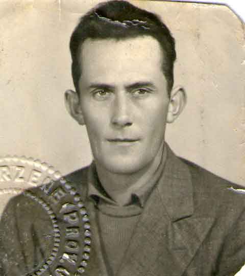 Archived head shot of a man, it has been stamped.