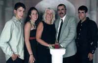 Recent coloured photo of five Damiani family members.