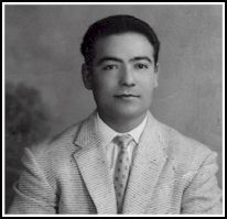 Portrait of Gaetano as a young man, wearing light-coloured suit.