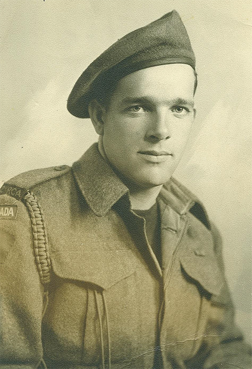 Military portrait of a young man in uniform.