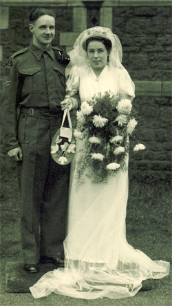 Engaged on the wedding day, the bride-to-be wearing a bouquet of flowers.