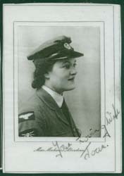 Framed profile image of Joan, young woman, wearing military attire.
