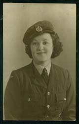 Portrait of the young Joan in military dress.