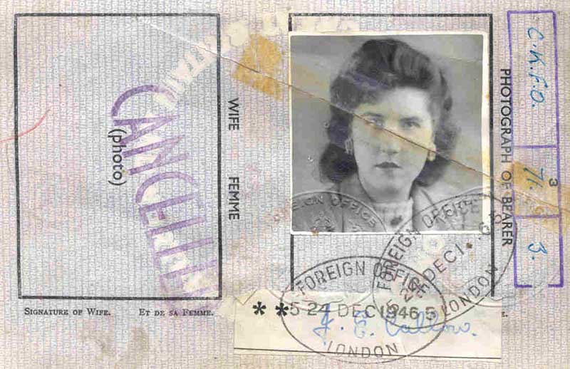Old passport copy with photo and stamps.