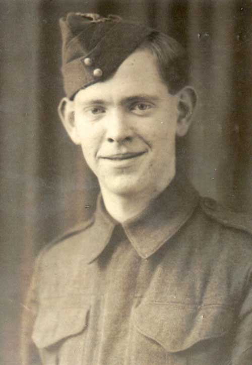 A young man is wearing a military uniform.