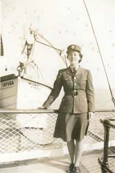 Young Catherine in military uniform, leaning against railing.