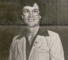 Old black and white portrait of Catherine, wearing glasses.