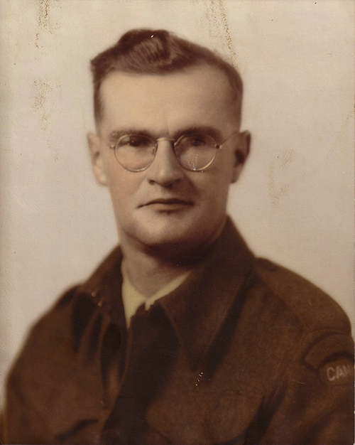 Headshot photo of handsome man.