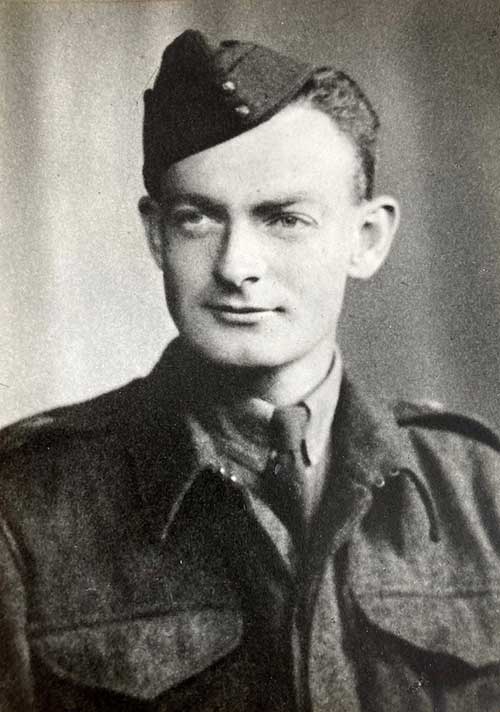 Portrait of a young man in military uniform.
