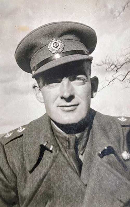 Portrait of a young man in military uniform.