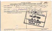 Immigration Identification Card with Canadian stamp on it.
