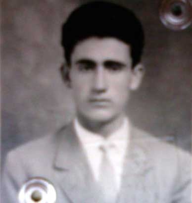 Black and white photo of a young man.