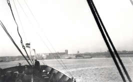 View of the harbour from the bow of a boat.