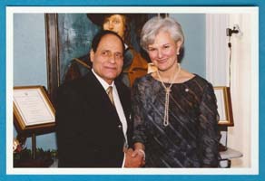Om shaking the hand of local female lieutenant governor.