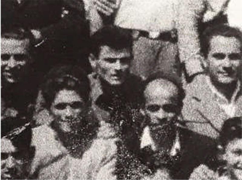 Black and white head shot photo of couple of people.