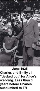 Woman seated while man stands next to her with hand on her shoulder.