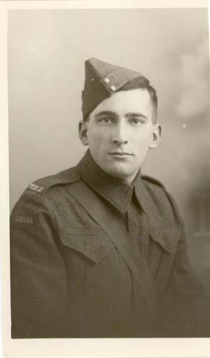Old portrait of young Langille, in military dress and wearing a cap.