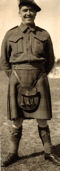 Young Charles in traditional kilt uniform.