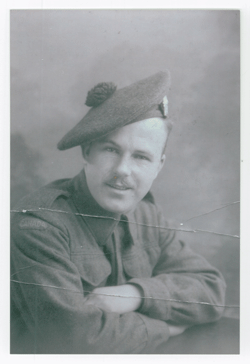 Serving portrait of young Lawrence in uniform and cap.