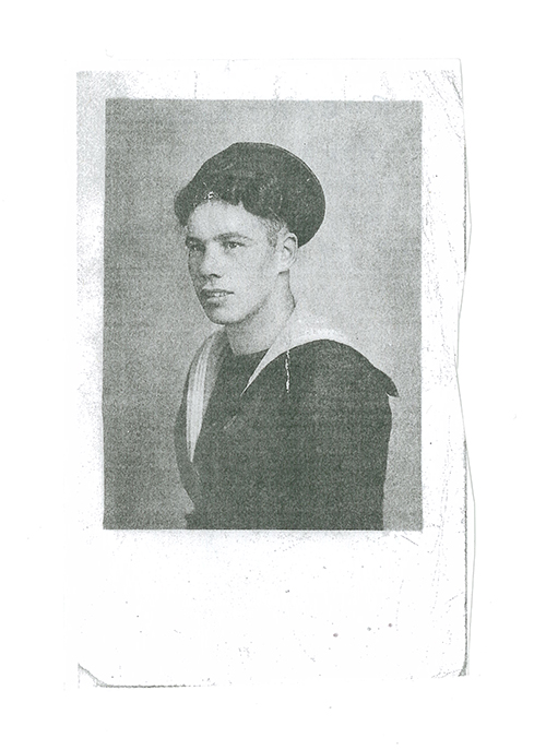 Old photo of young man in uniform.