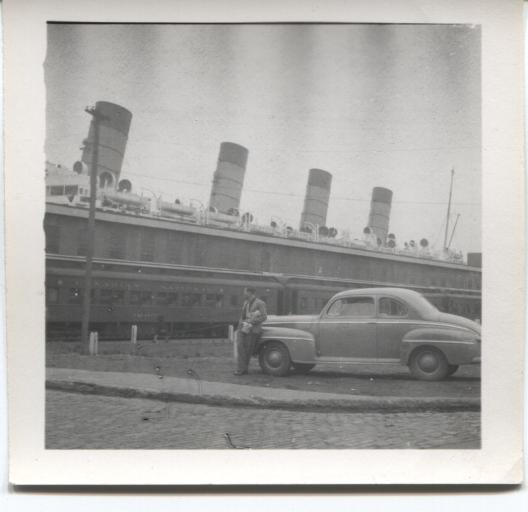 Man looking at ship.